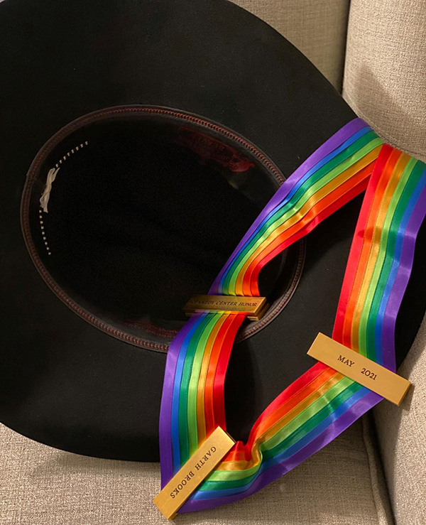 Garth Brooks hat with Kennedy Center rainbow ribbon on it